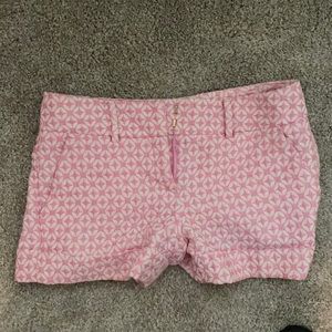 Pink suit shorts, mid thigh length size 4